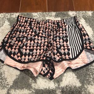 Wind shorts with spandex attached